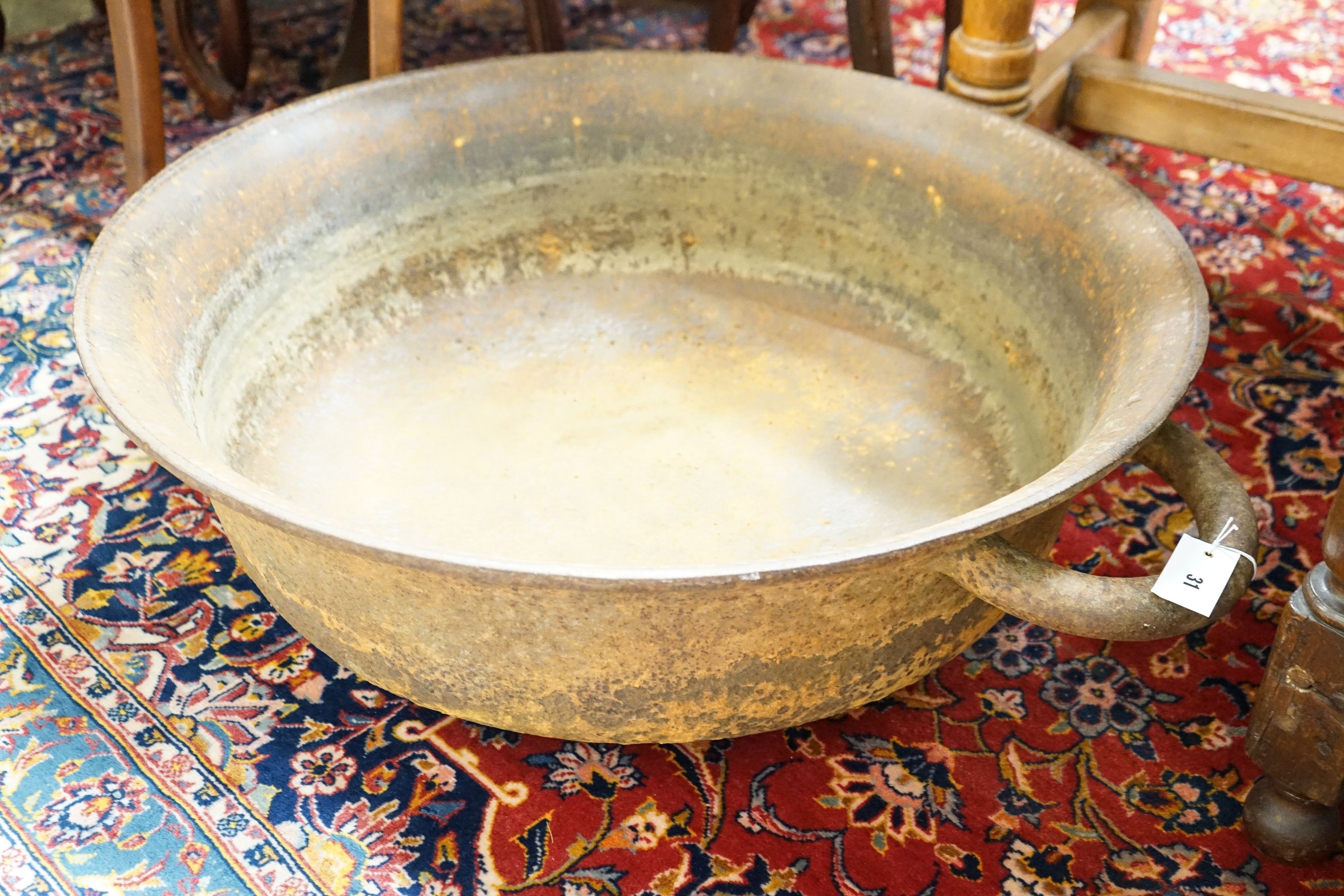A large cast iron French circular preserve pan, diameter 82cm, height 26cm